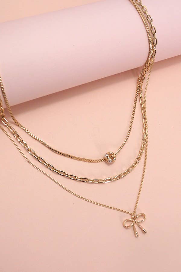 PEARL BOW CAHRM NECKLACE